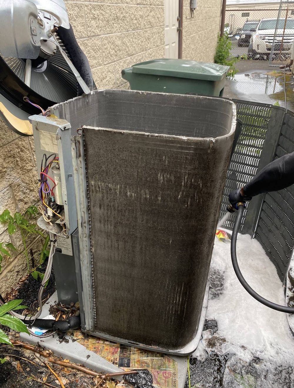 Cleaning a heavily soiled outdoor condenser coil